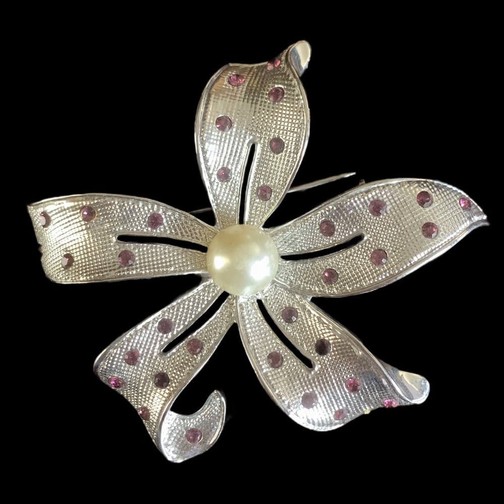 Vintage silver tone flower brooch with center pearl and amethyst crystals